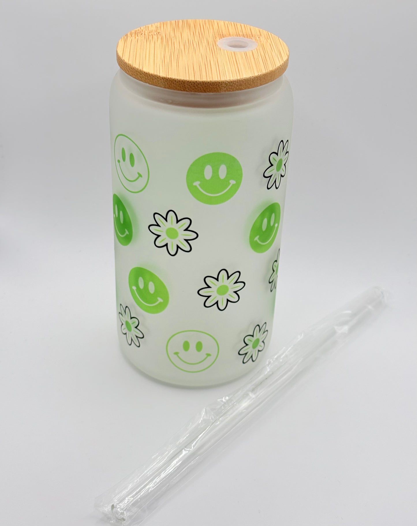 Green Smiley Face with Flower Pattern Glass Can