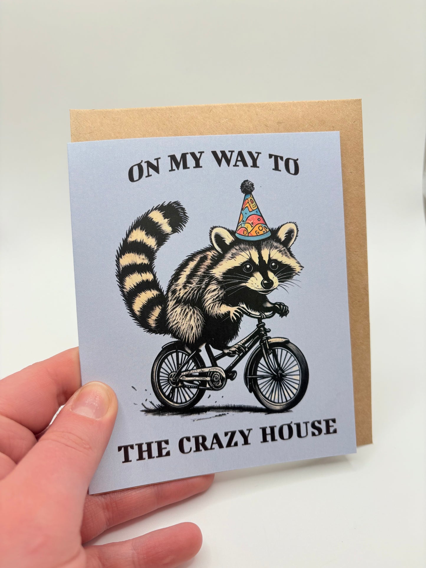 On My Way to the Crazy House - Funny Raccoon Greeting Card