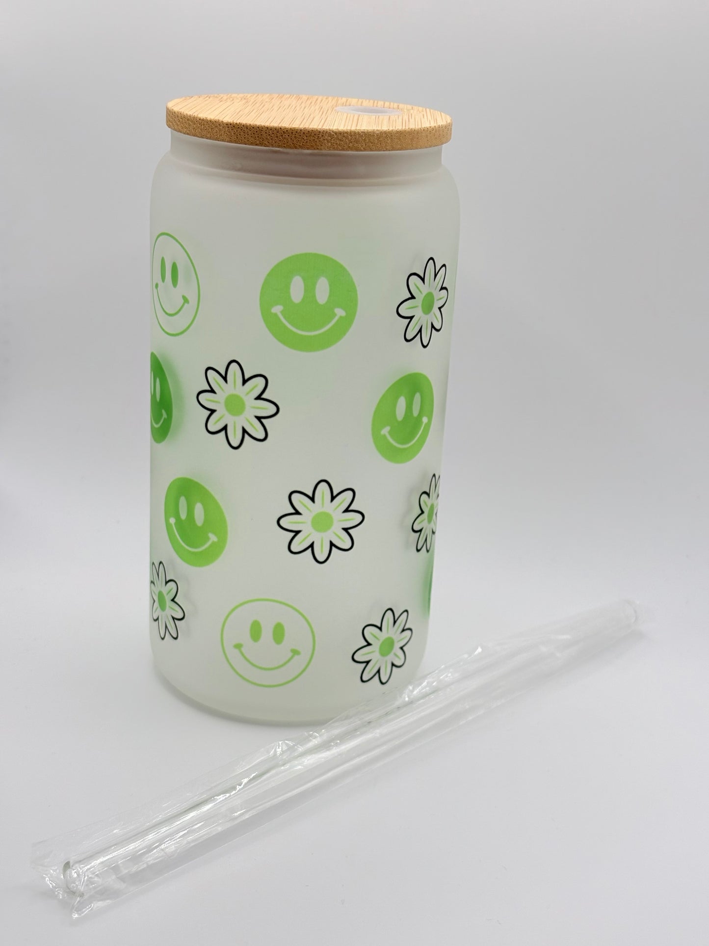 Green Smiley Face with Flower Pattern Glass Can