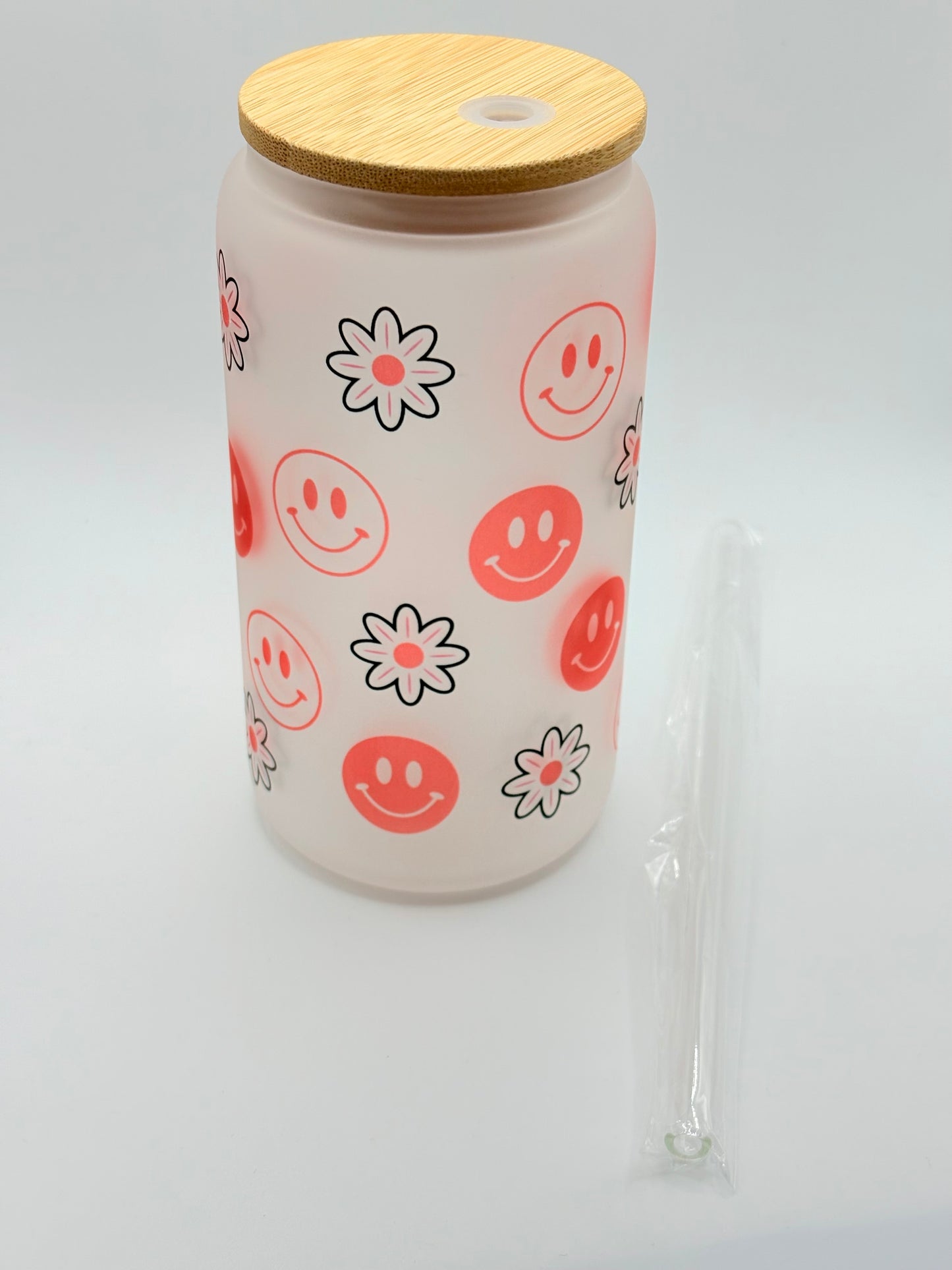 Red Smiley Face with Flower Pattern Glass Can
